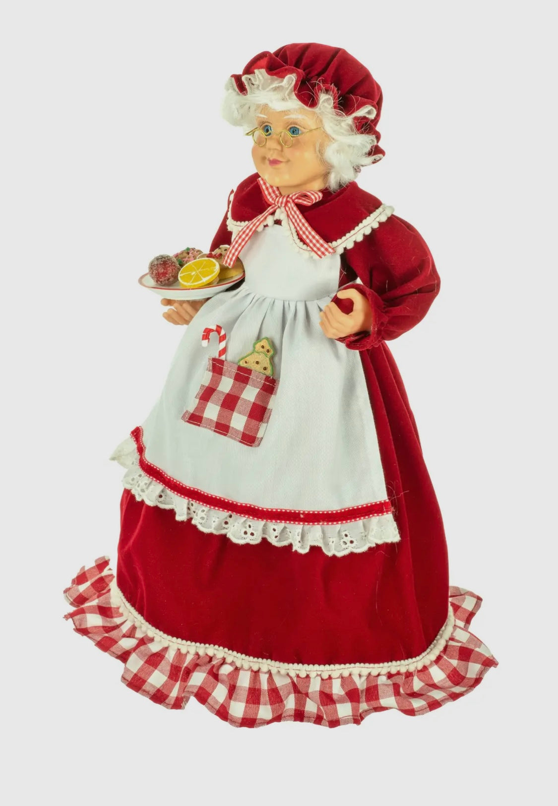 Standing Mrs Claus holding candy platter