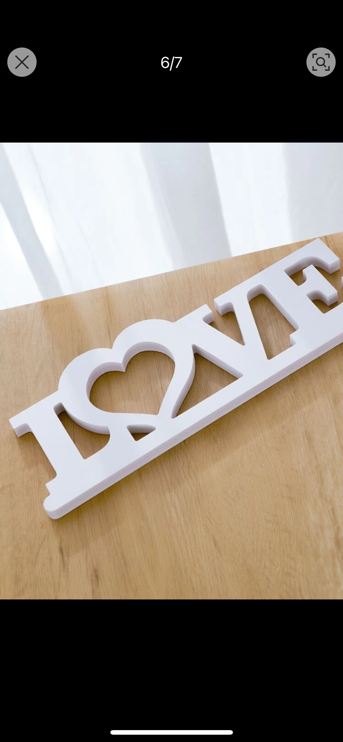 White wooden ‘LOVE’ plaque