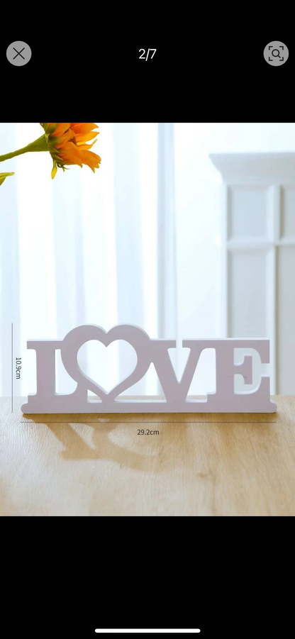 White wooden ‘LOVE’ plaque